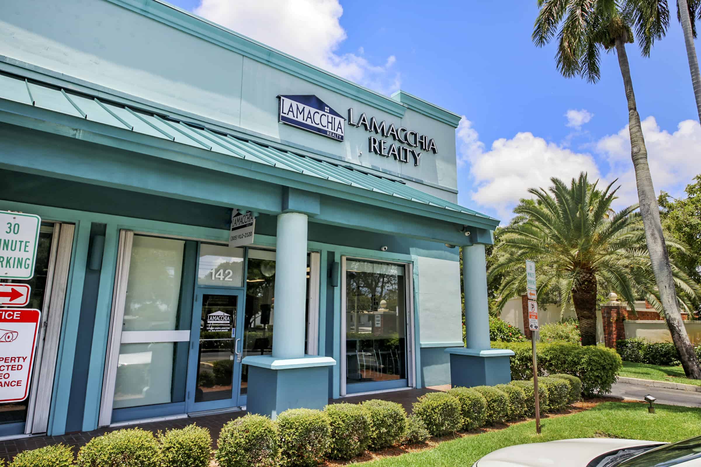 exterior view of Lamacchia Realty's Fort Lauderdale office at 5975 N Fed Hwy
